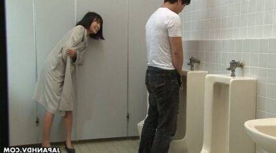 Crazy Asian chick Uta Kohaku pisses on dick of one stranger dude in a public toilet on badgirlnextdoor.com