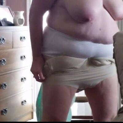 Putting on creame, girdle, clothes over her big tits on badgirlnextdoor.com