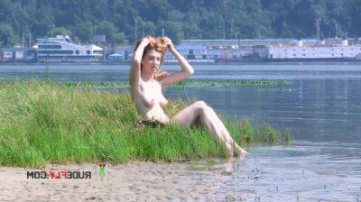 Playful blond nudist teen caught on camera naked at the beach on badgirlnextdoor.com